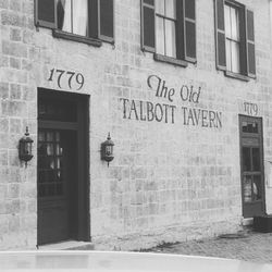 Woman standing in front of building