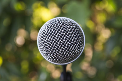 Close-up of microphone outdoors