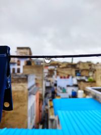 Close-up of swimming pool against sky