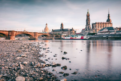 View of river with buildings in background