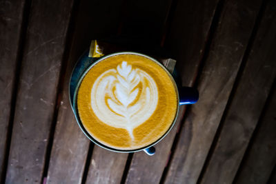 High angle view of cappuccino on table