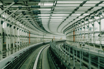 Railroad tracks seen through glass ceiling