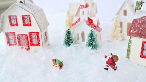 High angle view of christmas decorations on fake snow