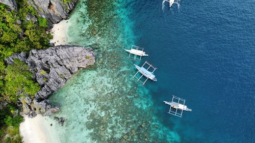 High angle view of tropical sea with boats