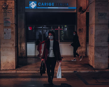 Full length of man standing on wall