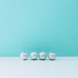 Close-up of candies on table against blue background