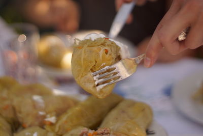 Close-up of woman preparing food