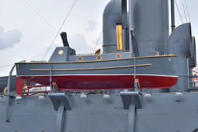 Low angle view of ship in sea against sky