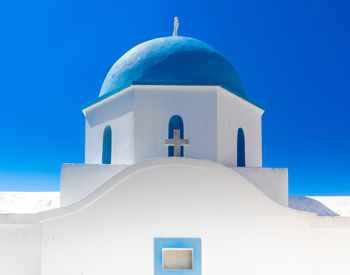 Low angle view of church against clear blue sky