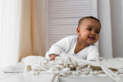 Portrait of cute boy at home