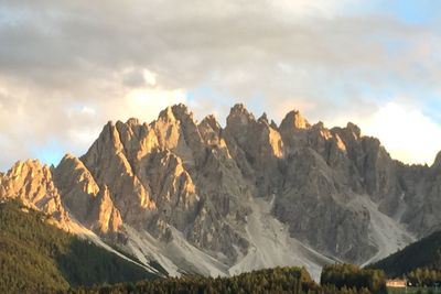 Panoramic view of mountain range against sky