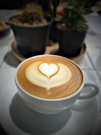 Close-up of cappuccino on table