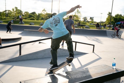 Man skateboarding on skateboard in city