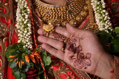 Close-up of woman holding hands