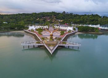 Scenic view of lake against cloudy sky