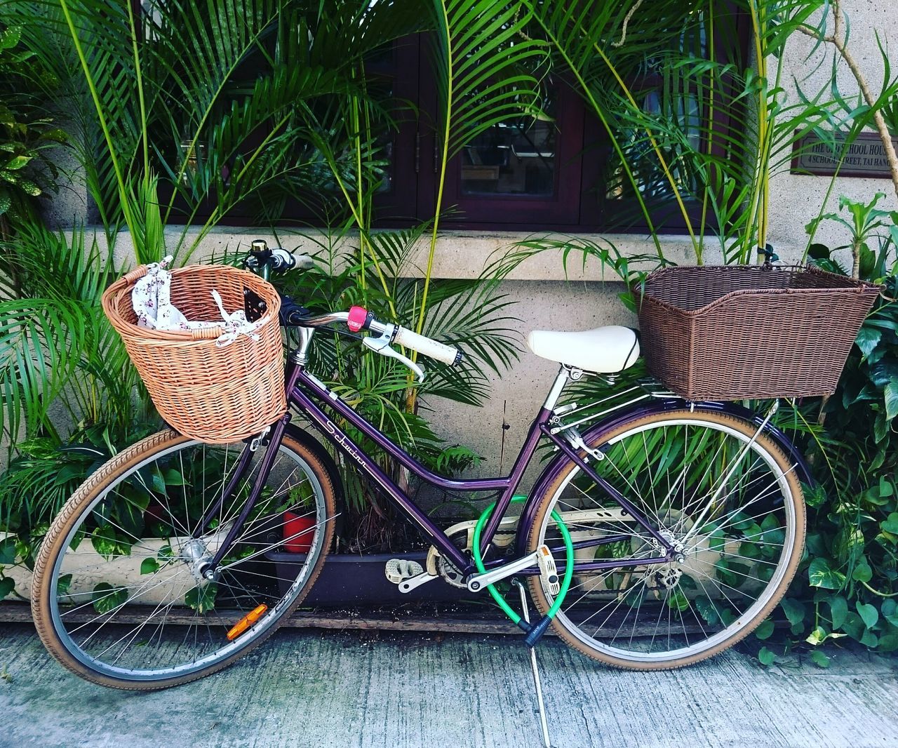 HIGH ANGLE VIEW OF PARKED BICYCLE