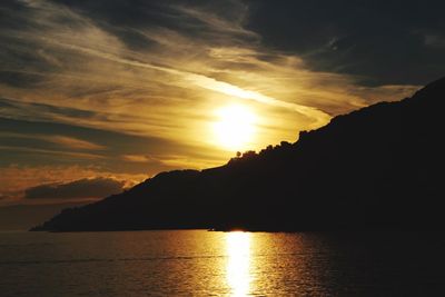 Scenic view of mountains at sunset