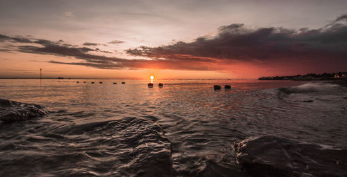 Scenic view of sea during sunset