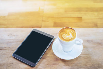 Coffee cup on table