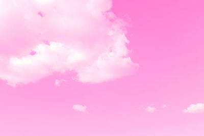 Low angle view of silhouette trees against sky