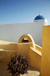 Church against clear sky on sunny day at santorini