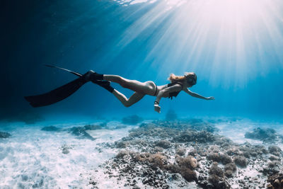 Man swimming in sea