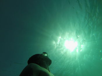 People swimming in sea