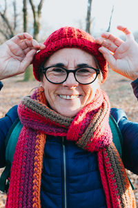 Portrait of young woman wearing warm clothing