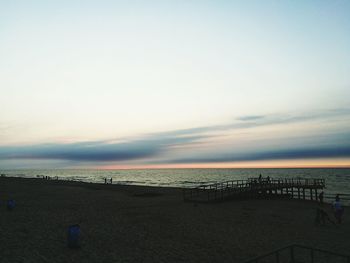 Scenic view of calm sea at sunset