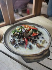 High angle view of fruits in plate on table