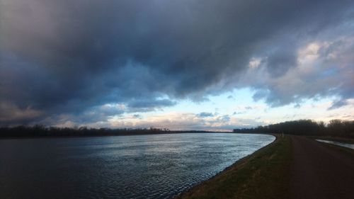 Scenic view of dramatic sky over sea