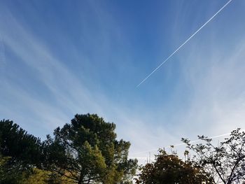 Low angle view of vapor trail in sky