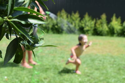 Children playing in field
