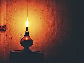 Close-up of lit candle