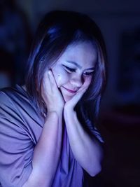 Portrait of a smiling young woman