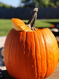 Close-up of pumpkin against orange sky