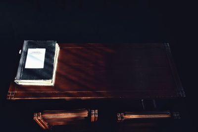 Close-up of table against black background