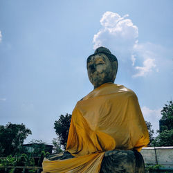 Low angle view of statue against sky