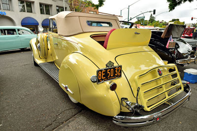 Vintage car parked on road