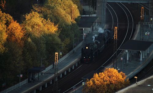 High angle view of train on railroad tracks during autumn