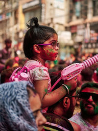 Side view of young woman looking away