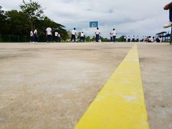 People on road against sky