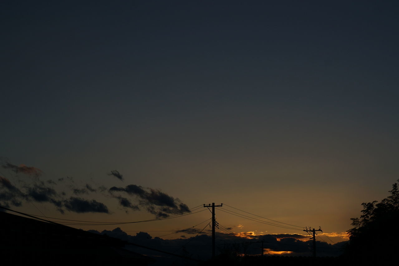 silhouette, power line, electricity pylon, sunset, low angle view, electricity, power supply, copy space, connection, sky, tranquility, dusk, beauty in nature, clear sky, cable, nature, scenics, tranquil scene, tree, fuel and power generation