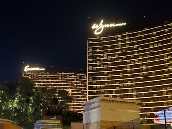 Low angle view of illuminated building at night