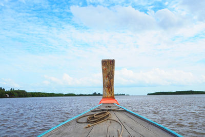 Boat in sea against sky