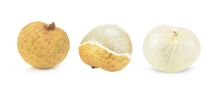 Close-up of fruits against white background