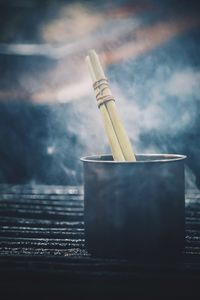 Close-up of cigarette on table