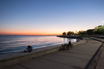 Scenic view of sea at sunset