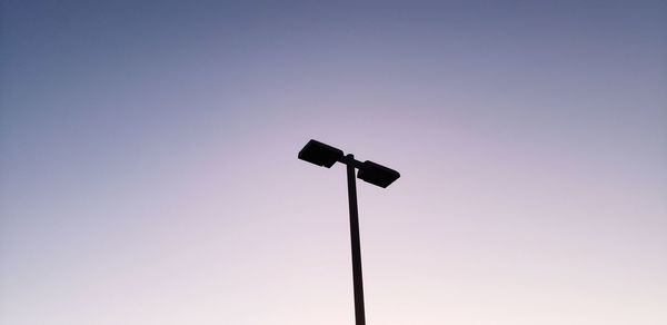 Low angle view of street light against clear sky