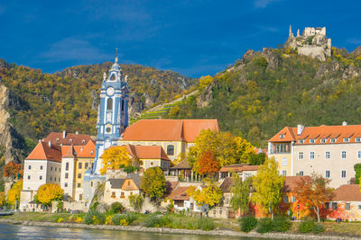 Stift durnstein amidst buildings against sky